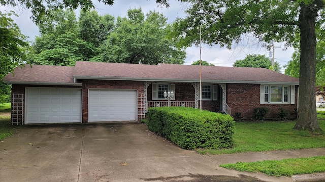 415 N Locust St, Marshfield, MO 65706 - ranch-style home featuring a garage, brick siding, driveway, and roof with shingles