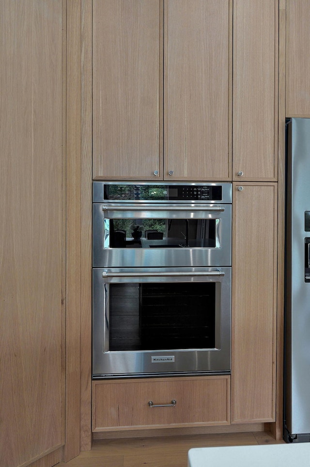 3725 E Woodhue St, Springfield, MO 65802 - kitchen view of appliances with stainless steel finishes and light brown cabinets