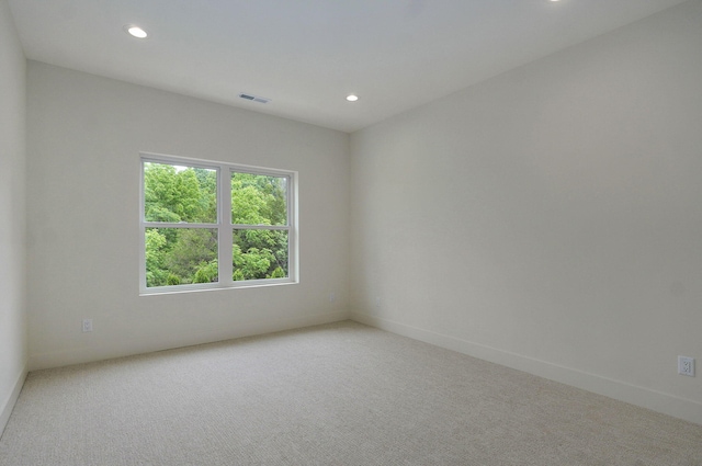 3725 E Woodhue St, Springfield, MO 65802 - unfurnished room featuring recessed lighting, light colored carpet, and baseboards