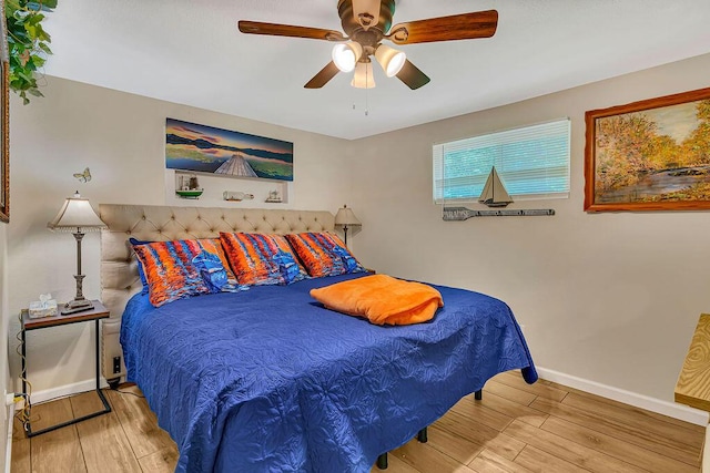 360 Cathy St, Branson, MO 65616 - bedroom with wood finished floors, baseboards, and a ceiling fan