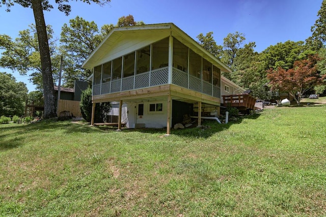 360 Cathy St, Branson, MO 65616 - rear view of property featuring a sunroom, a yard, a deck, and central air condition unit