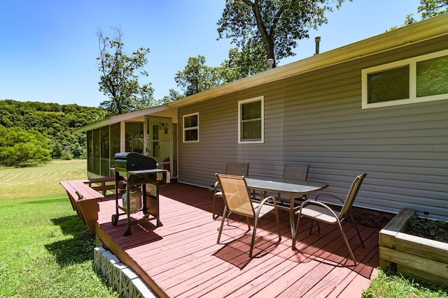360 Cathy St, Branson, MO 65616 - deck featuring a yard, a sunroom, and outdoor dining area