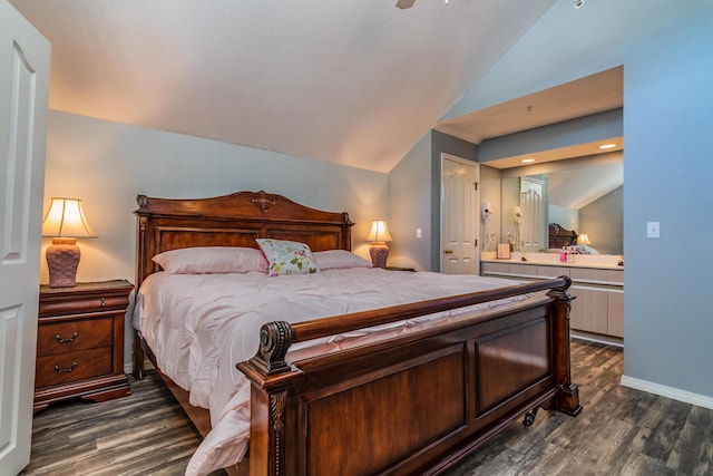 79 Anglers Pointe Dr Unit 5, Branson, MO 65616 - bedroom with lofted ceiling, dark wood-style flooring, and baseboards