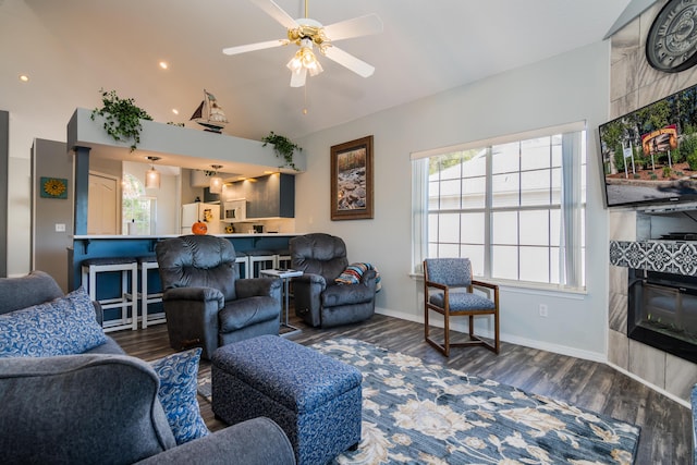79 Anglers Pointe Dr Unit 5, Branson, MO 65616 - living room featuring vaulted ceiling, wood finished floors, a ceiling fan, and baseboards