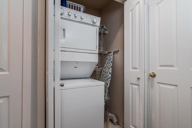 79 Anglers Pointe Dr Unit 5, Branson, MO 65616 - laundry area featuring stacked washing machine and dryer