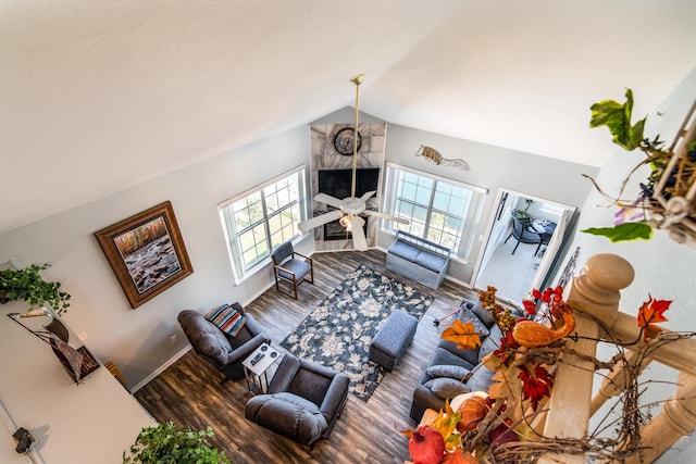 79 Anglers Pointe Dr Unit 5, Branson, MO 65616 - living area with healthy amount of natural light, wood finished floors, lofted ceiling, and baseboards