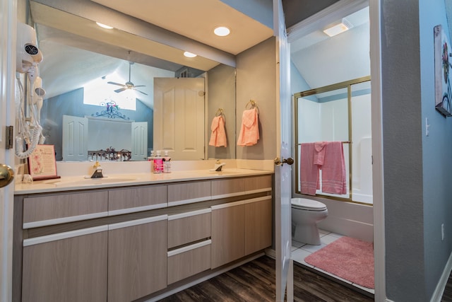 79 Anglers Pointe Dr Unit 5, Branson, MO 65616 - full bath with double vanity, vaulted ceiling, toilet, wood finished floors, and enclosed tub / shower combo