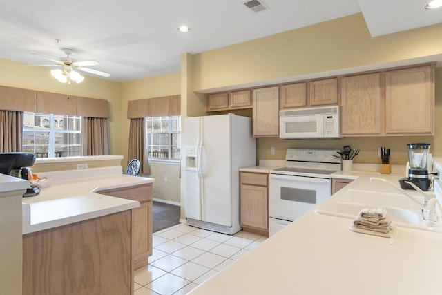 2800 Green Mountain Dr Unit 331, Branson, MO 65616 - kitchen featuring white appliances, light tile patterned floors, light countertops, a ceiling fan, and a sink