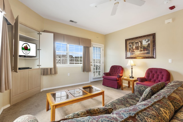 2800 Green Mountain Dr Unit 331, Branson, MO 65616 - carpeted living area featuring a ceiling fan and baseboards