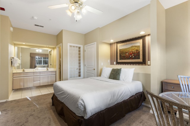 2800 Green Mountain Dr Unit 331, Branson, MO 65616 - bedroom featuring ensuite bathroom, light colored carpet, light tile patterned floors, and baseboards