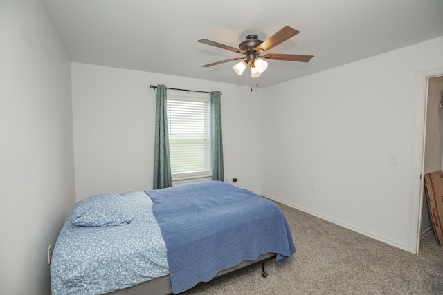 13447 E 1424th Rd, Stockton, MO 65785 - carpeted bedroom featuring baseboards and a ceiling fan