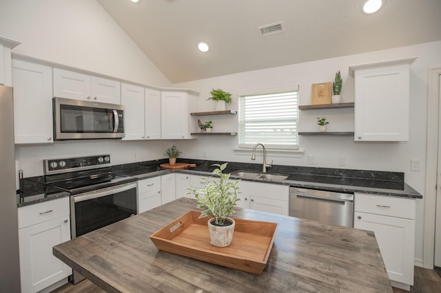 13447 E 1424th Rd, Stockton, MO 65785 - kitchen with appliances with stainless steel finishes, open shelves, a sink, white cabinetry, and recessed lighting