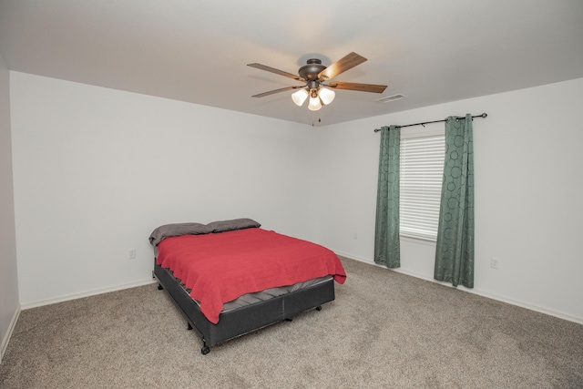 13447 E 1424th Rd, Stockton, MO 65785 - carpeted bedroom with baseboards and ceiling fan