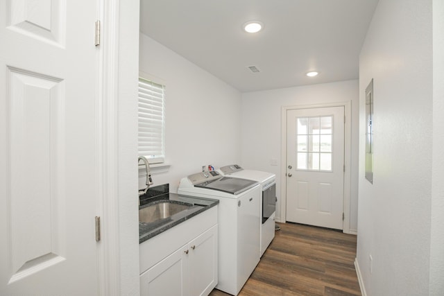 13447 E 1424th Rd, Stockton, MO 65785 - laundry area featuring washing machine and clothes dryer, dark wood finished floors, recessed lighting, cabinet space, and baseboards