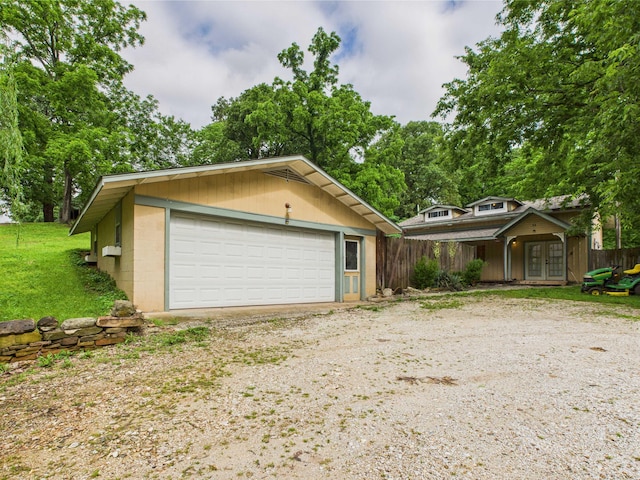 54 Southgate Dr, Harrison, AR 72601 - view of front of home featuring french doors, concrete block siding, and a detached garage