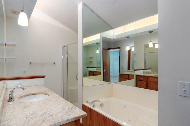 6025 S Farm Rd Unit 157, Springfield, MO 65810 - bathroom featuring a whirlpool tub, a stall shower, and vanity