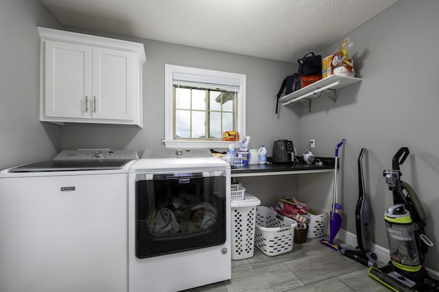994 S Cumberland Ave, Republic, MO 65738 - laundry area featuring washer and clothes dryer and cabinet space