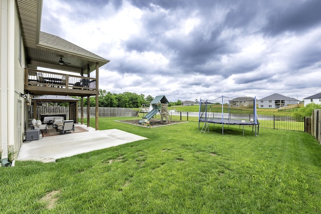 994 S Cumberland Ave, Republic, MO 65738 - view of yard featuring a trampoline, a playground, a patio area, and ceiling fan