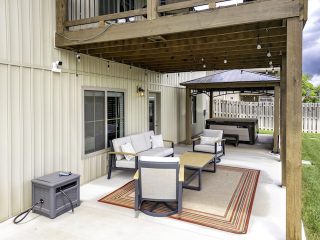 994 S Cumberland Ave, Republic, MO 65738 - view of patio / terrace featuring a hot tub, an outdoor hangout area, and a gazebo