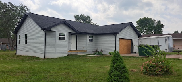 712 Fir St, Buffalo, MO 65622 - view of front of property with an attached garage, a front yard, and roof with shingles