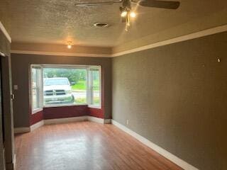 828 Stratford Pl, Neosho, MO 64850 - spare room with baseboards and ceiling fan