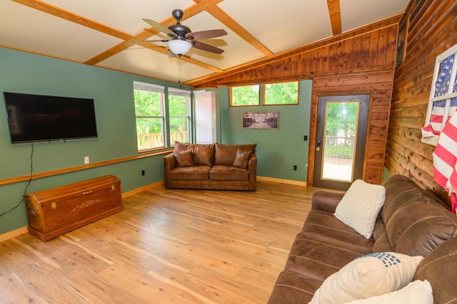 1288 County Road 334, Tecumseh, MO 65760 - living area featuring ceiling fan, baseboards, wooden walls, and wood finished floors