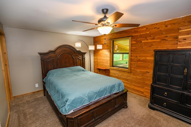 1288 County Road 334, Tecumseh, MO 65760 - carpeted bedroom with wooden walls and ceiling fan