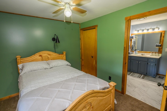 1288 County Road 334, Tecumseh, MO 65760 - bedroom featuring a closet, a sink, baseboards, and ensuite bath