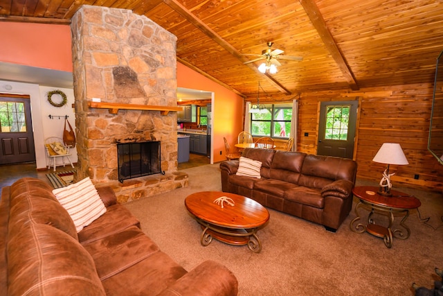 1288 County Road 334, Tecumseh, MO 65760 - carpeted living area with wood ceiling, ceiling fan, and a stone fireplace
