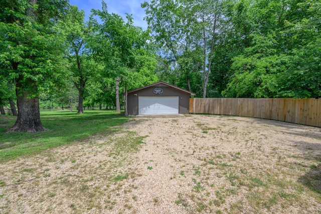 1288 County Road 334, Tecumseh, MO 65760 - view of yard with a garage and an outbuilding