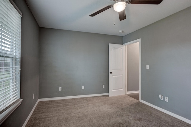 3383 Lusk Dr, Neosho, MO 64850 - carpeted spare room with a ceiling fan and baseboards