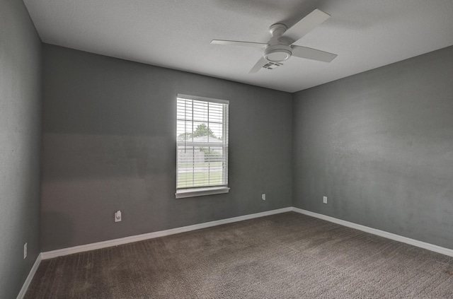 3383 Lusk Dr, Neosho, MO 64850 - unfurnished room with ceiling fan, dark colored carpet, and baseboards