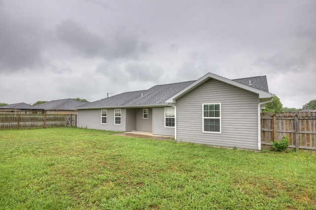 3383 Lusk Dr, Neosho, MO 64850 - rear view of property with roof with shingles and a patio