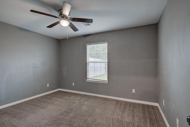 3383 Lusk Dr, Neosho, MO 64850 - spare room with ceiling fan, carpet floors, and baseboards