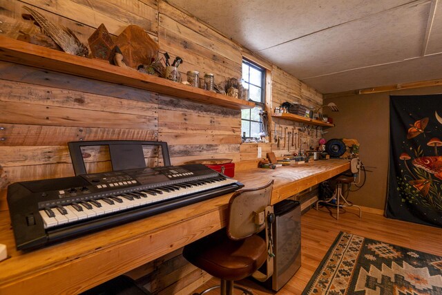 651/TBD Round Robin Ln, Yellville, AR 72687 - interior space with wood walls, light wood-type flooring, and a workshop area