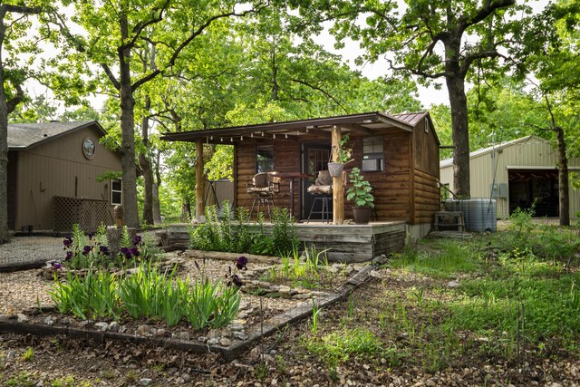 651/TBD Round Robin Ln, Yellville, AR 72687 - view of front of home with an outbuilding and metal roof