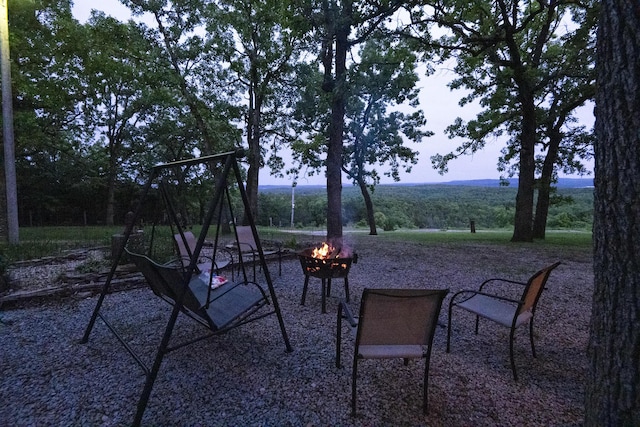 651/TBD Round Robin Ln, Yellville, AR 72687 - view of patio / terrace with a fire pit and a playground