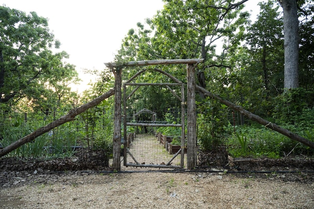 651/TBD Round Robin Ln, Yellville, AR 72687 - gate featuring a garden