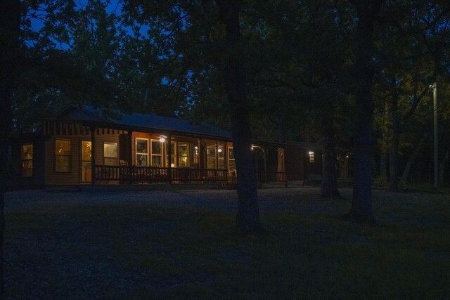 651/TBD Round Robin Ln, Yellville, AR 72687 - rear view of house featuring a porch