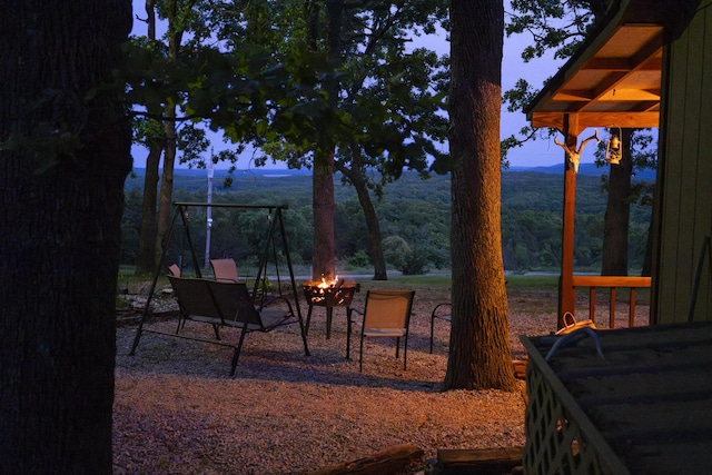 651/TBD Round Robin Ln, Yellville, AR 72687 - view of patio / terrace featuring an outdoor fire pit and a mountain view