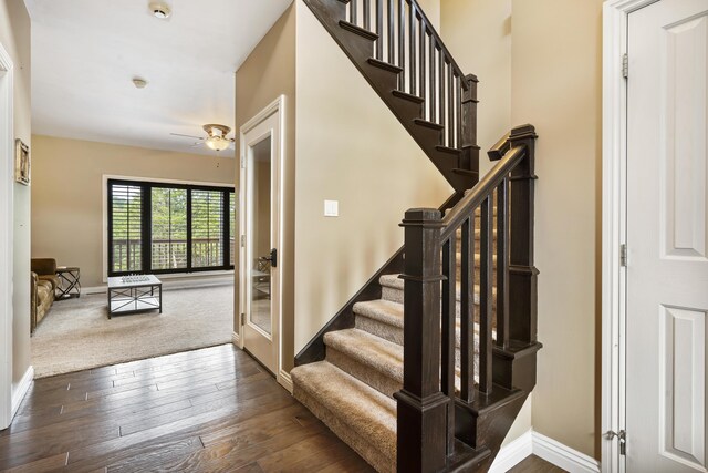 807 S Stanford Dr, Rogersville, MO 65742 - staircase featuring ceiling fan, baseboards, and hardwood / wood-style floors