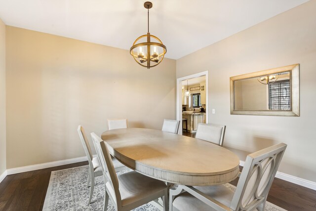 807 S Stanford Dr, Rogersville, MO 65742 - dining area featuring a chandelier, baseboards, and dark wood finished floors