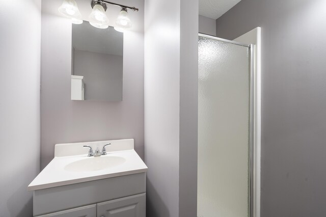 807 S Stanford Dr, Rogersville, MO 65742 - bathroom featuring a shower stall and vanity