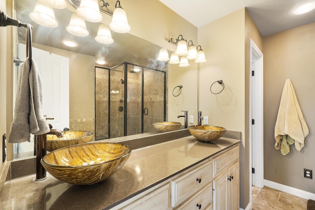 807 S Stanford Dr, Rogersville, MO 65742 - bathroom featuring a shower stall, double vanity, and baseboards