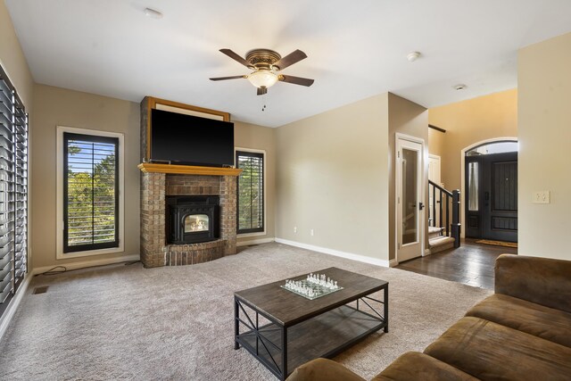 807 S Stanford Dr, Rogersville, MO 65742 - living room with a ceiling fan, healthy amount of natural light, a brick fireplace, and baseboards