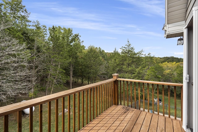 807 S Stanford Dr, Rogersville, MO 65742 - wooden terrace featuring a forest view