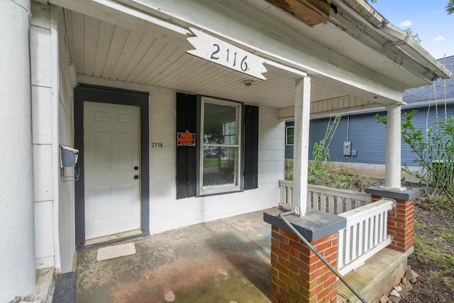 2116 N Campbell Ave, Springfield, MO 65803 - view of exterior entry with a porch