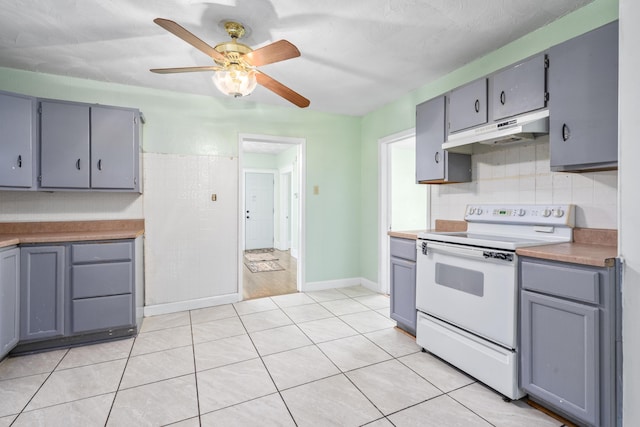 2116 N Campbell Ave, Springfield, MO 65803 - kitchen with white range with electric cooktop, under cabinet range hood, gray cabinetry, and ceiling fan