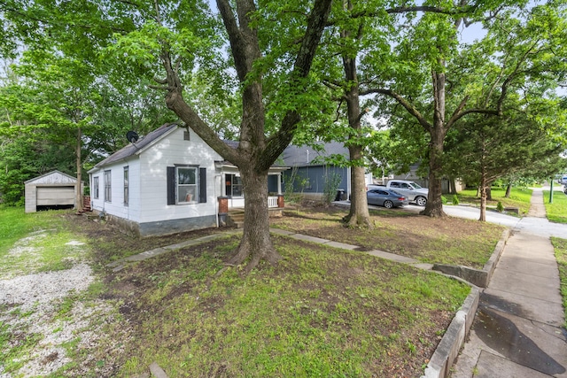 2116 N Campbell Ave, Springfield, MO 65803 - view of front facade featuring driveway and a garage