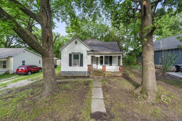 2116 N Campbell Ave, Springfield, MO 65803 - bungalow-style house with covered porch and roof with shingles